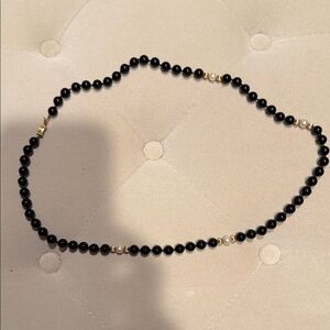 Elegant Black and Pearl Beaded Necklace with 14 Karet gold accents.